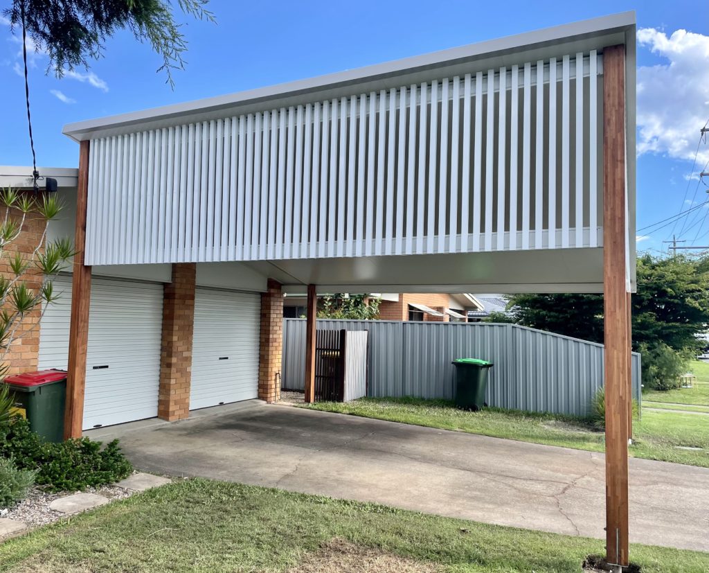 attached double carport roller doors tewantin coastal patios