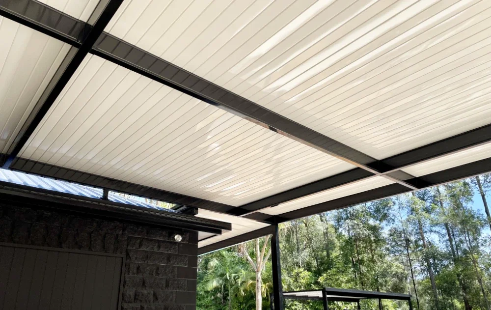 Insulated and single skin patio roofing compared
