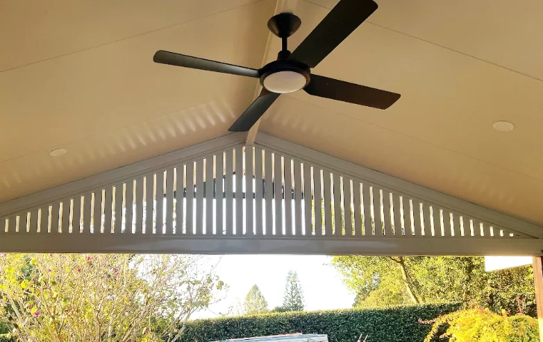 Outdoor ceiling with integrated lighting and a fan
