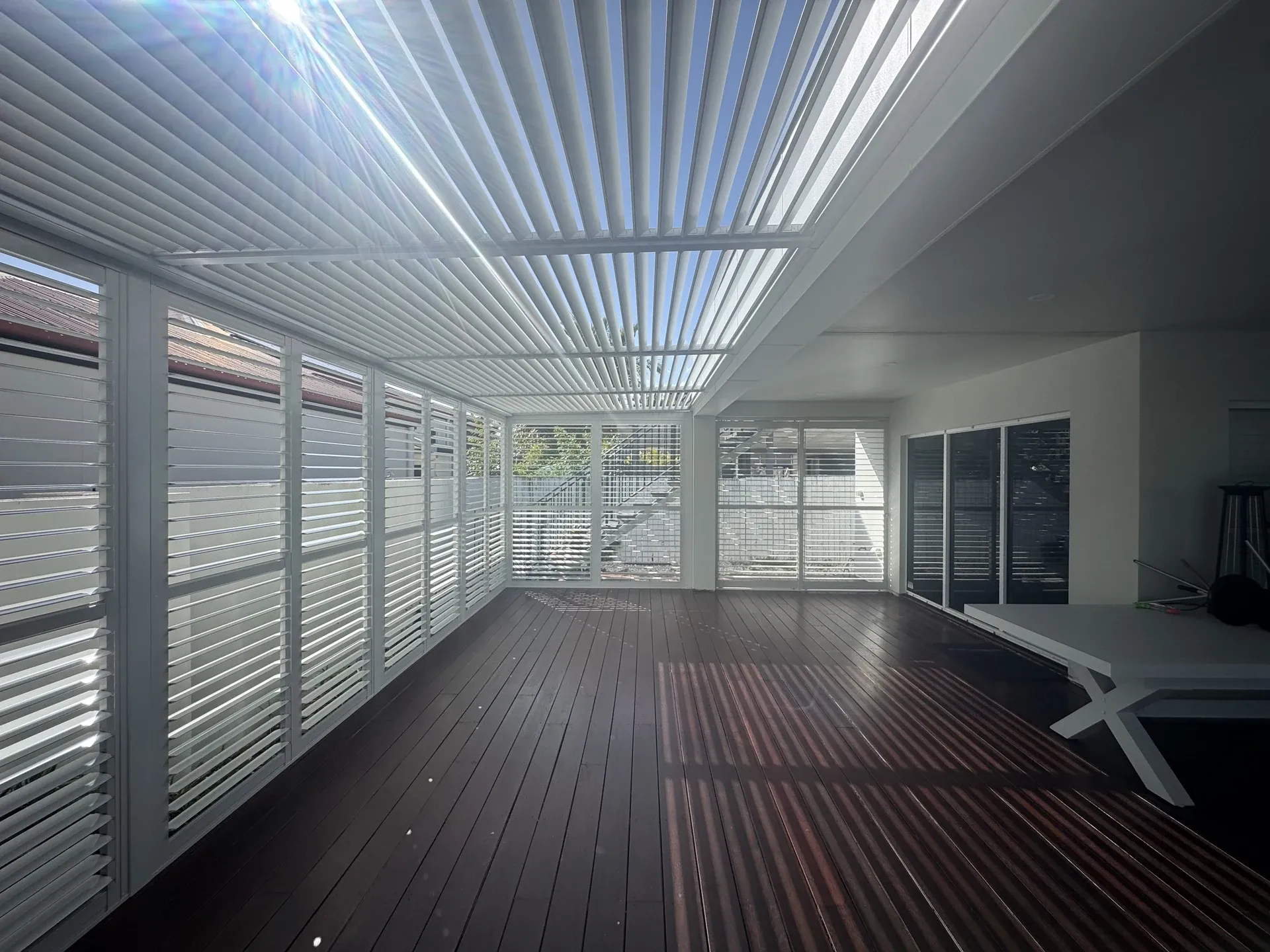 Louvred roof patio over an outdoor living area